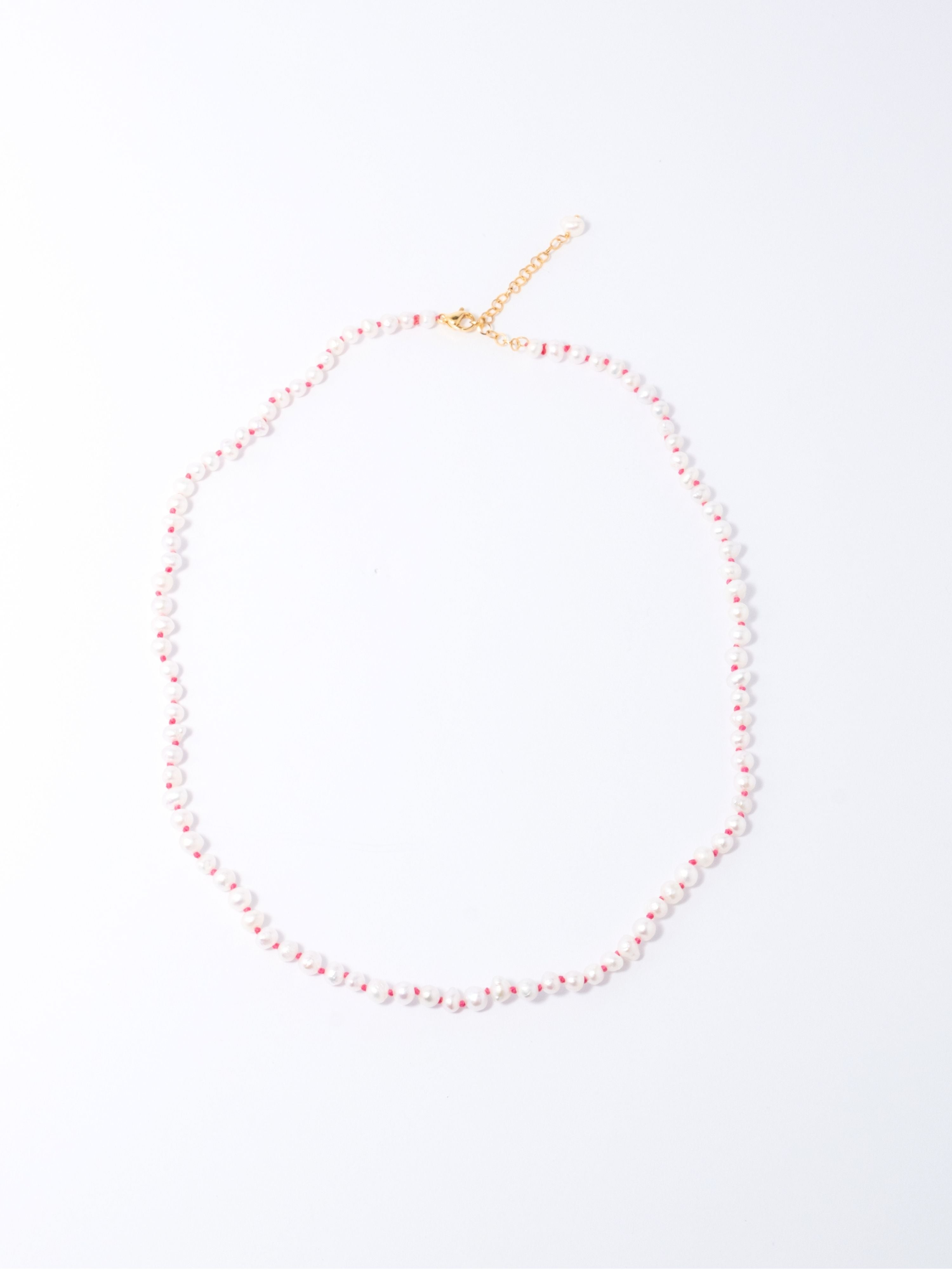 Collar Perla Nudo Fucsia